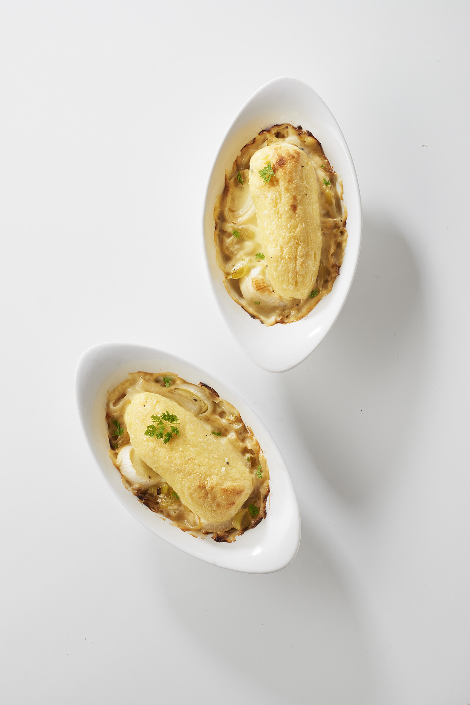 Quenelles sauce aigre douce et fondue de poireaux